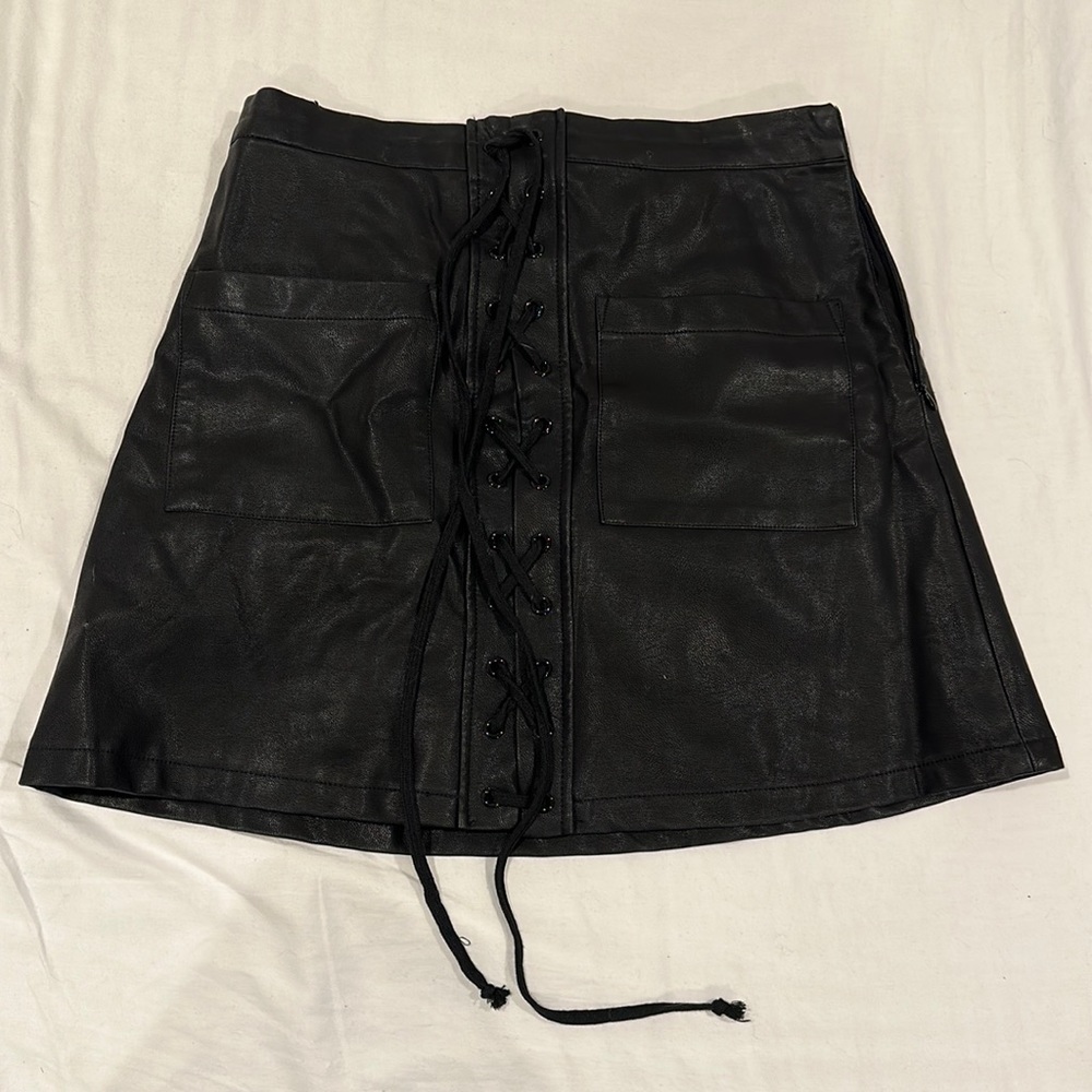 Olivaceous Black Faux Leather lace-up skirt with pockets. Size: M